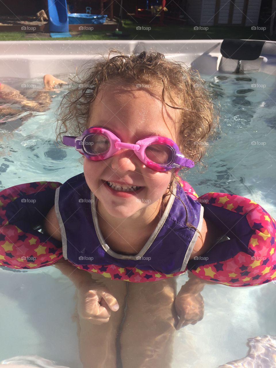 Girl swimming with goggles funny