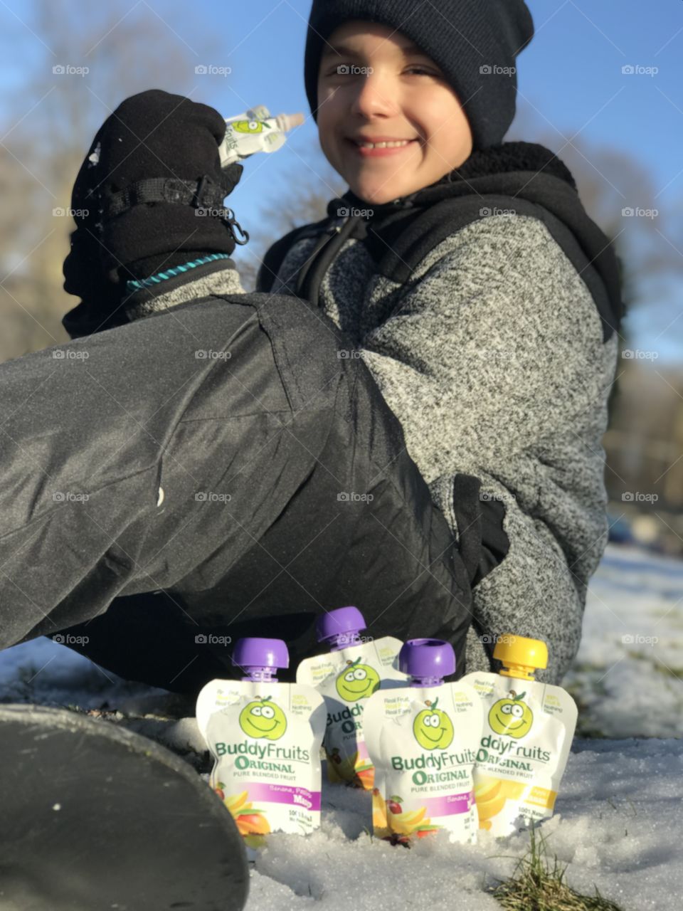 Boy and buddy fruits in the winter 
