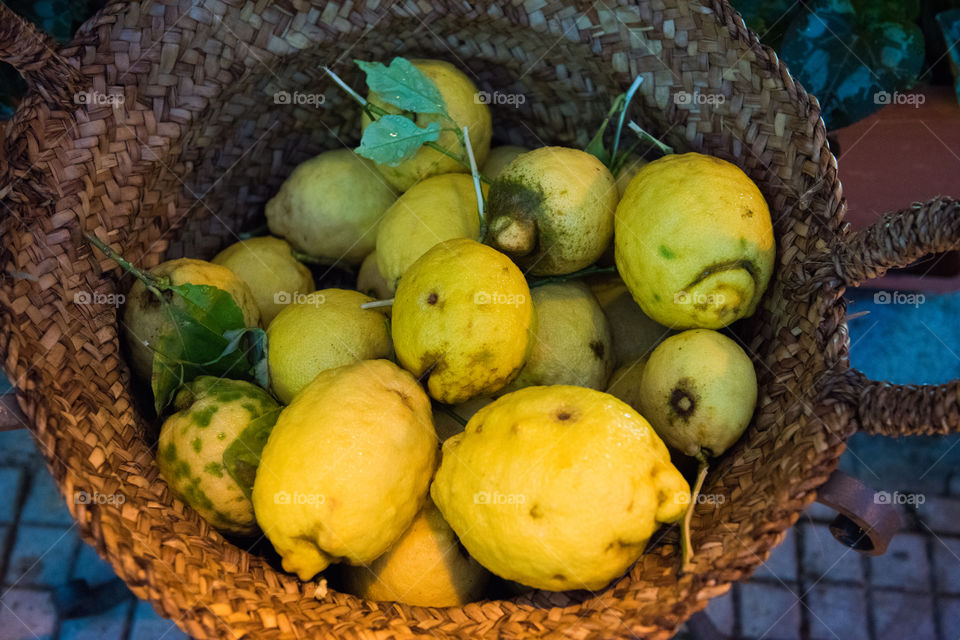 Lemons in basket on The island of Sicily.