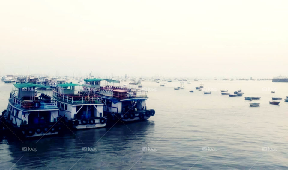 Ferry or merchant vessel used to carry passengers.Easy Transportation from one place to another over the coast.