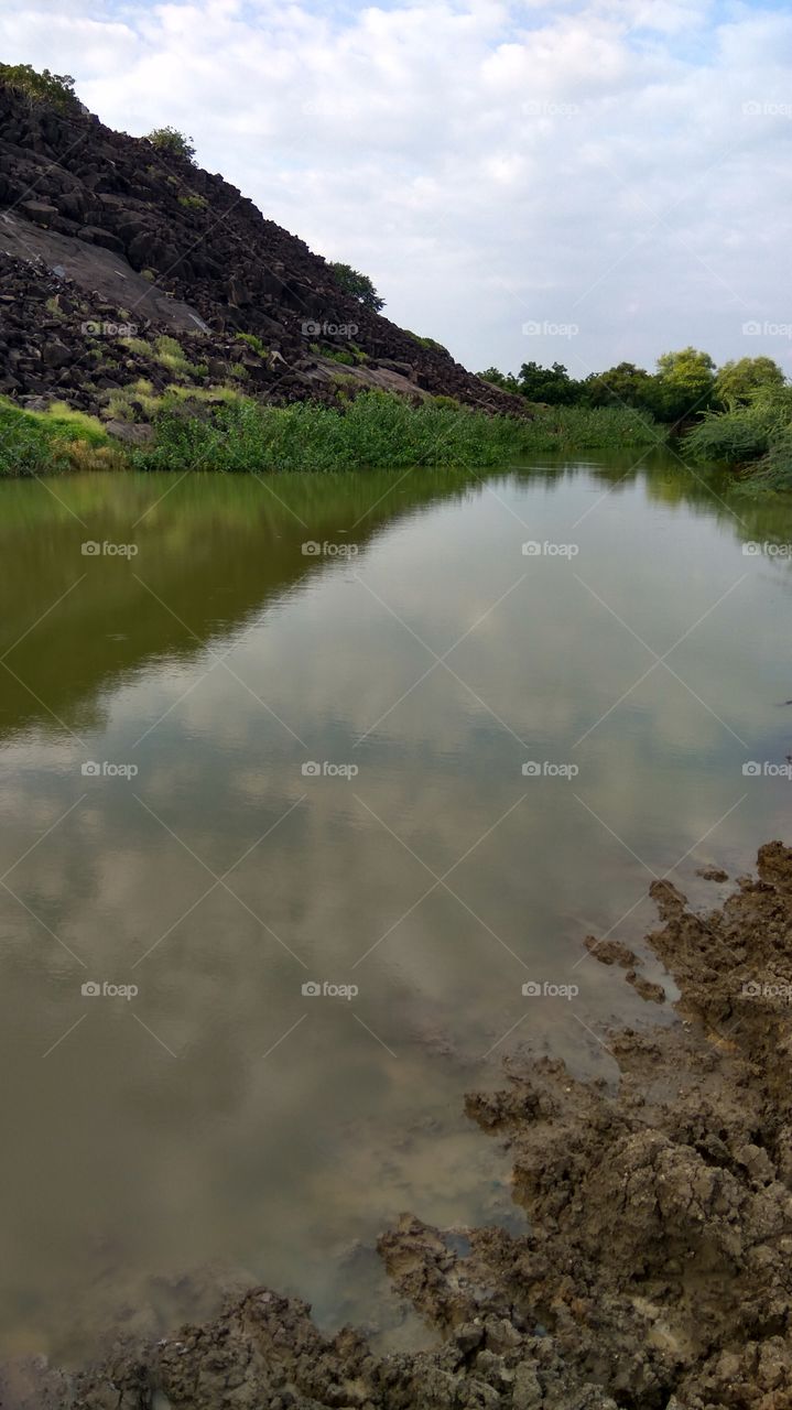 reflection of hill shade in water