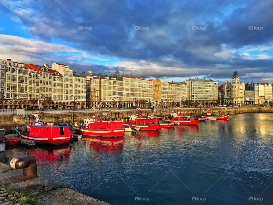 Port boats buildings and sky