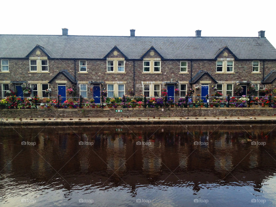 water colourful houses reflection by dannytwotaps