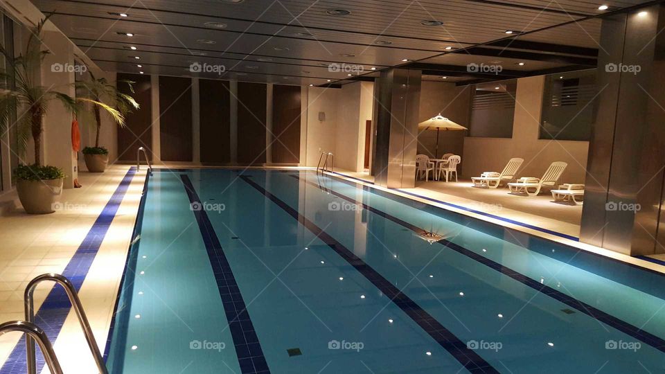 Indoor swimming pool at hotel.
