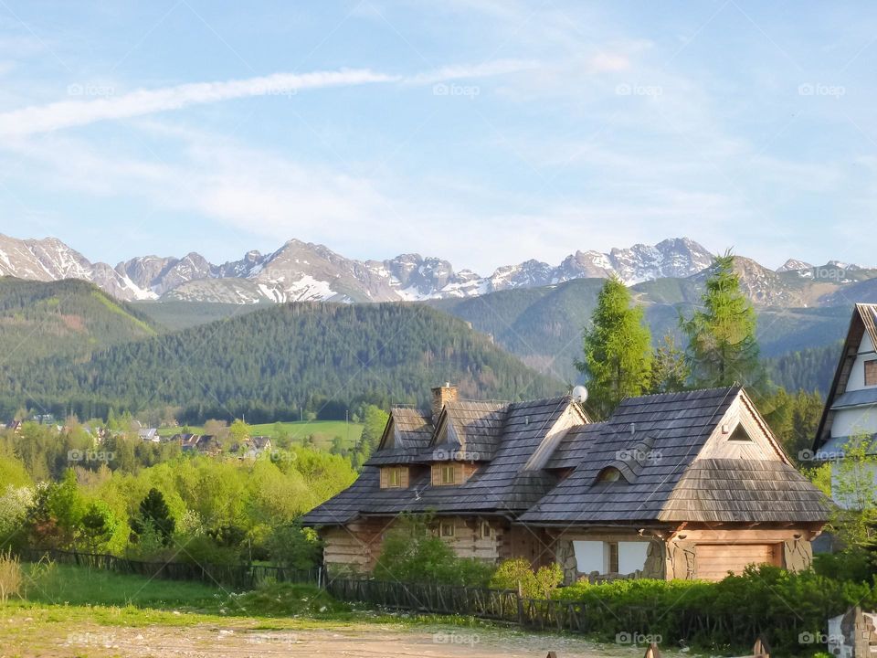 a village near the jungle and beautiful mountains