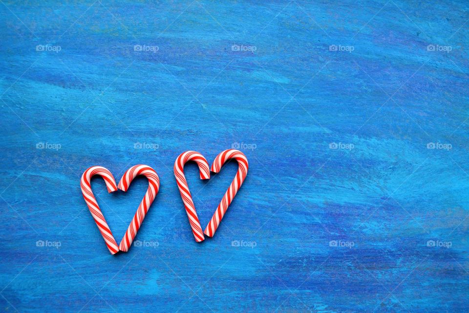 two hearts blue background art abstract