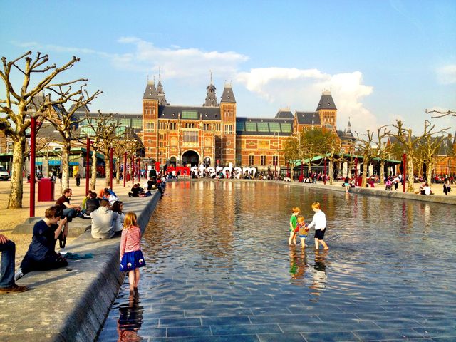 Playing in Park Water. Children play in a pool in Amsterdam