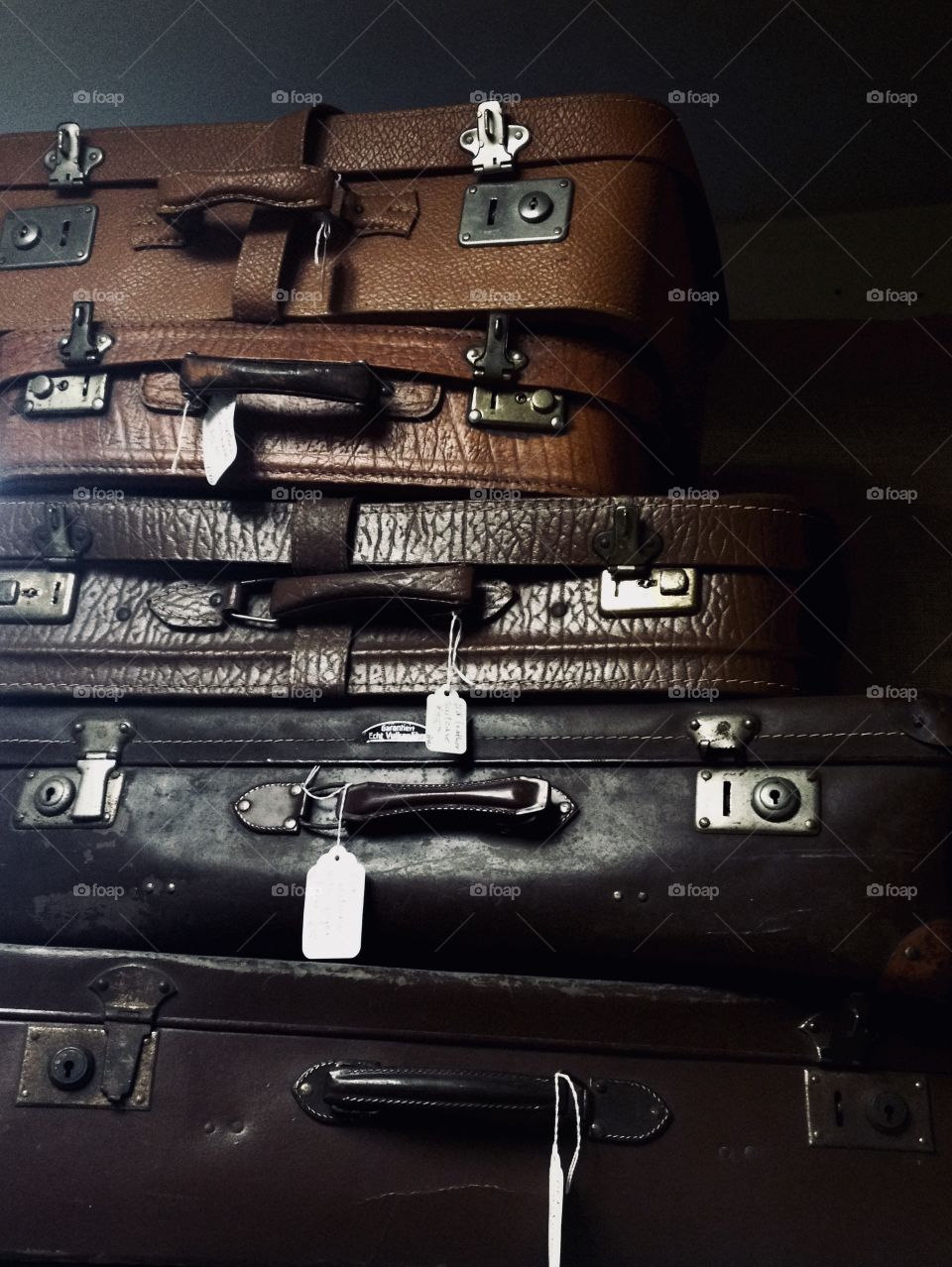 Stacked suitcases for sale