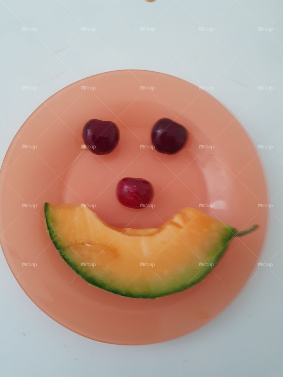 a face with fruits