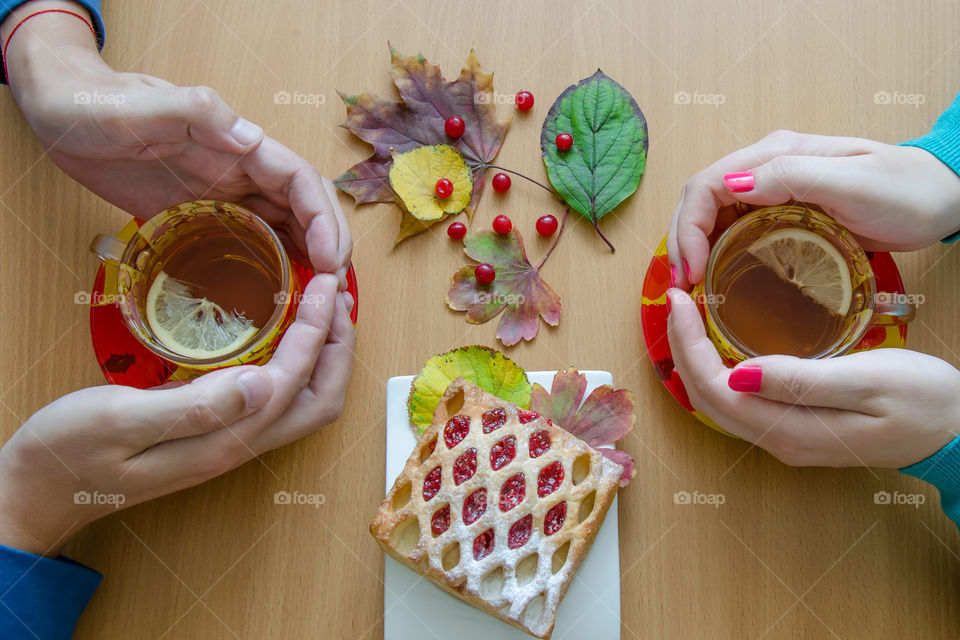couple holds in his hands tea, breakfast with tasteless
