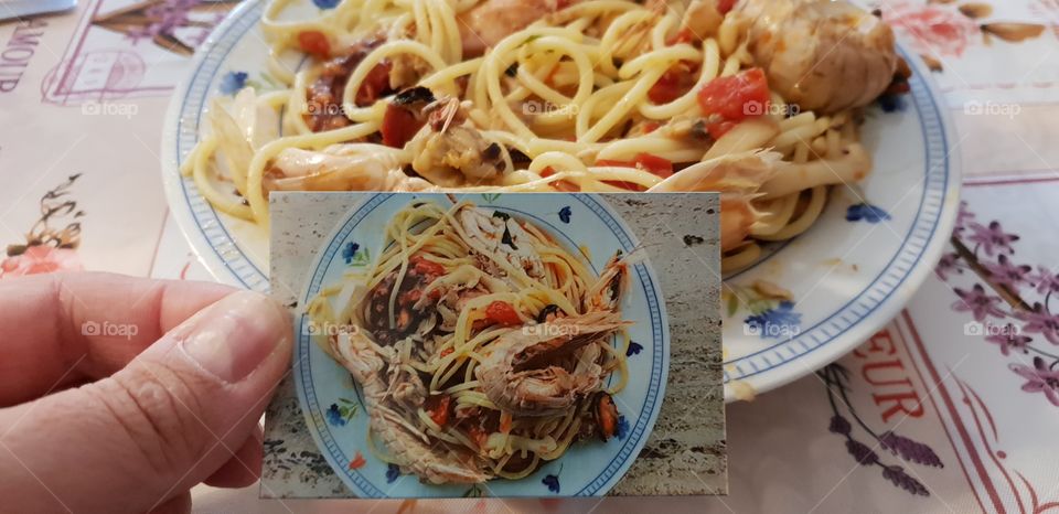 Noodles with seafood and instant picture of the italian dish
