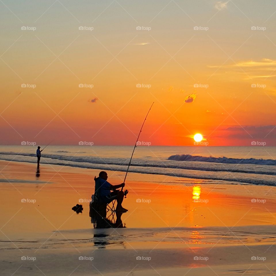 surf fishing at sunrise