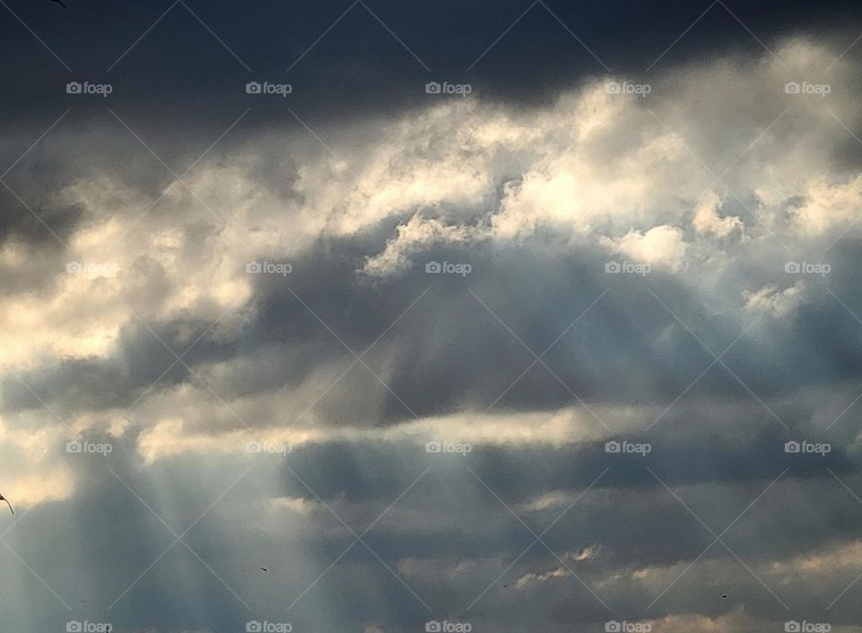 The clouds are painting a mountain landscape in the sky. The miracle of nature is unending