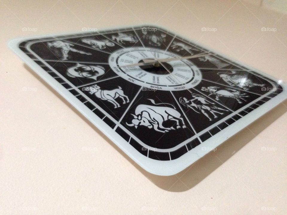 Clock with horoscopes