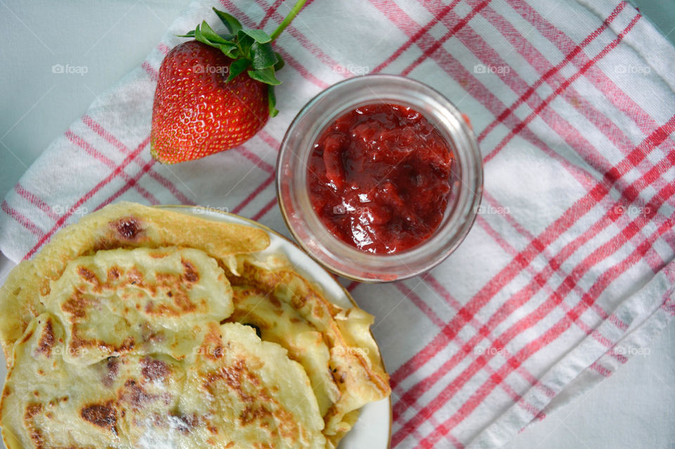 Strawberry jam and pancakes