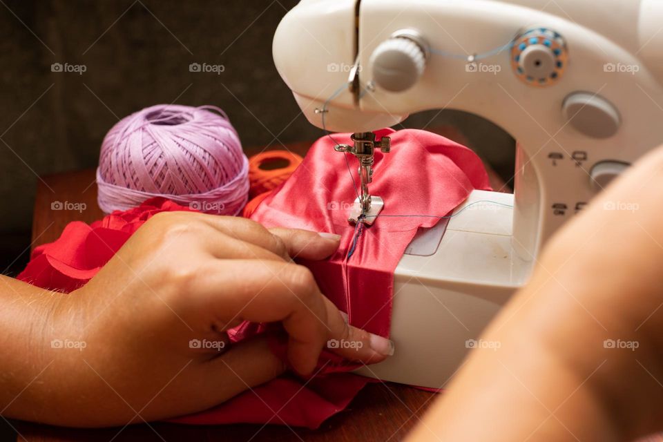 Working at the sewing machine