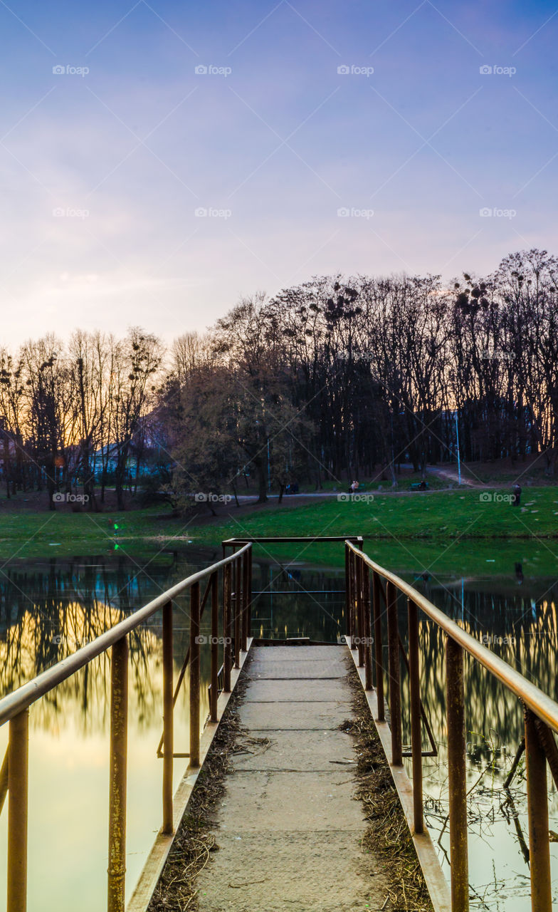 city park with lake in the spring season