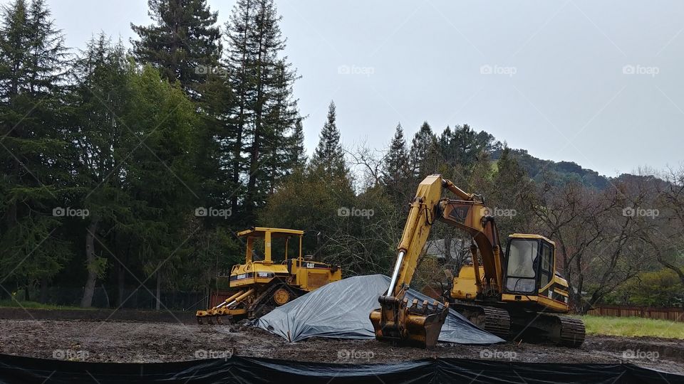 Construction Site in Empty Lot of Forest Area Bulldozer and Power Shovel