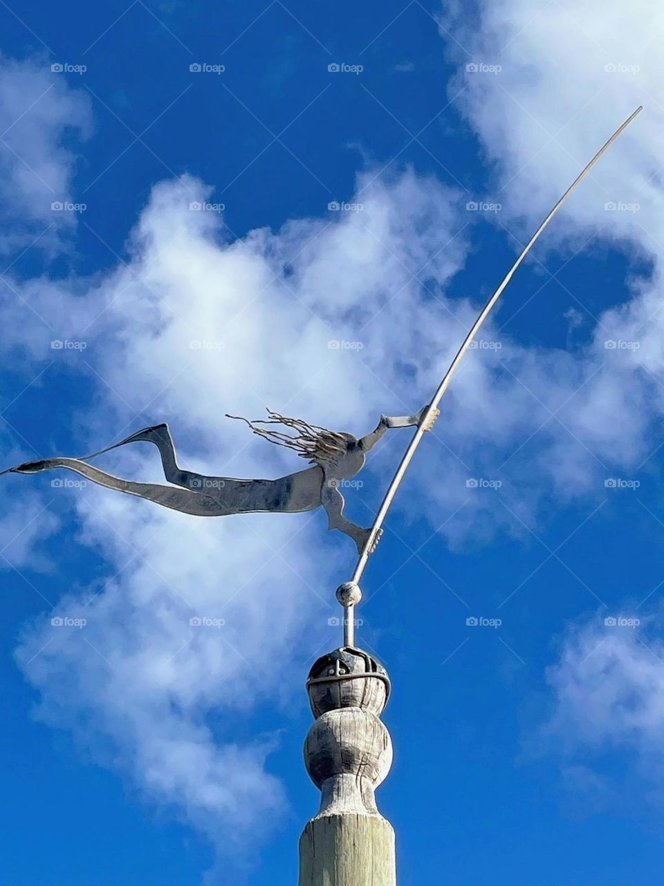 Weather vane against a cloudy blue sky! Jervoise Bay, Western Australia.