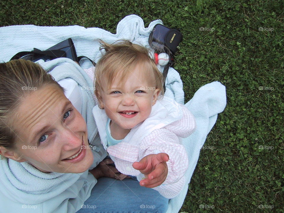 You are my Sunshine- daughter and mother looking up, daughter point at and admiring her daddy.