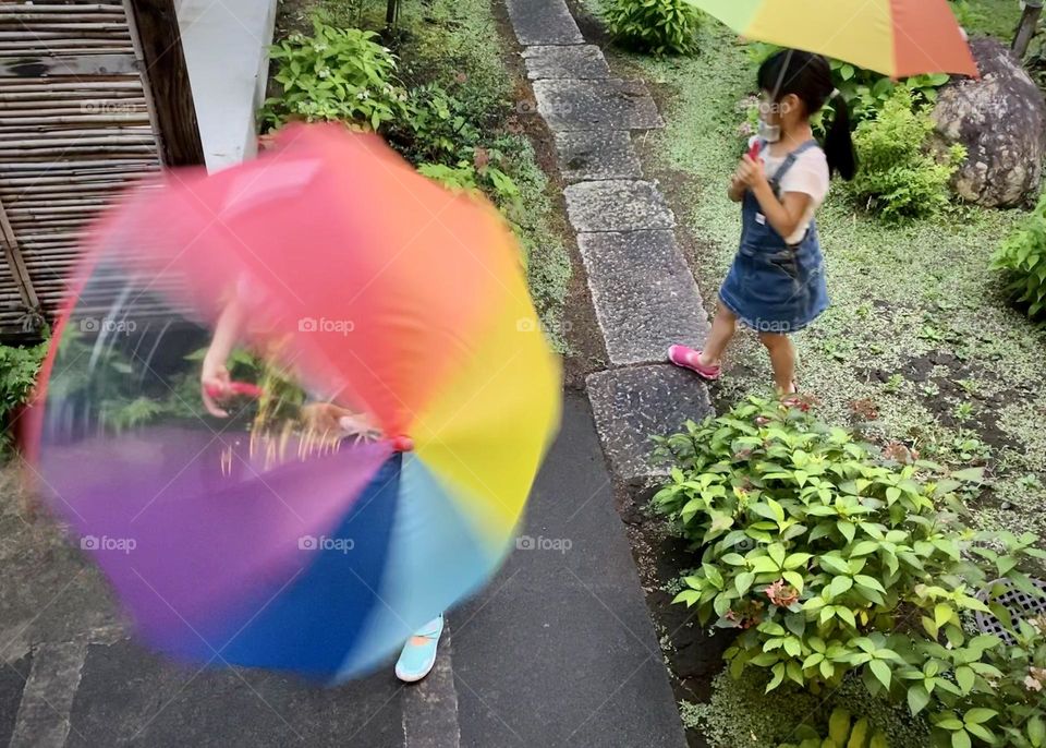 Colorful umbrella spinning 