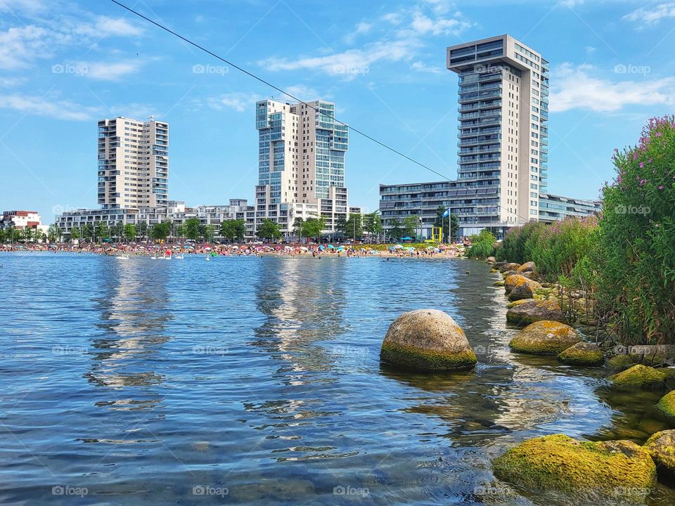 Beach in the city.Nice to swim and waterskate on a tropical day in the Netherlands near home.