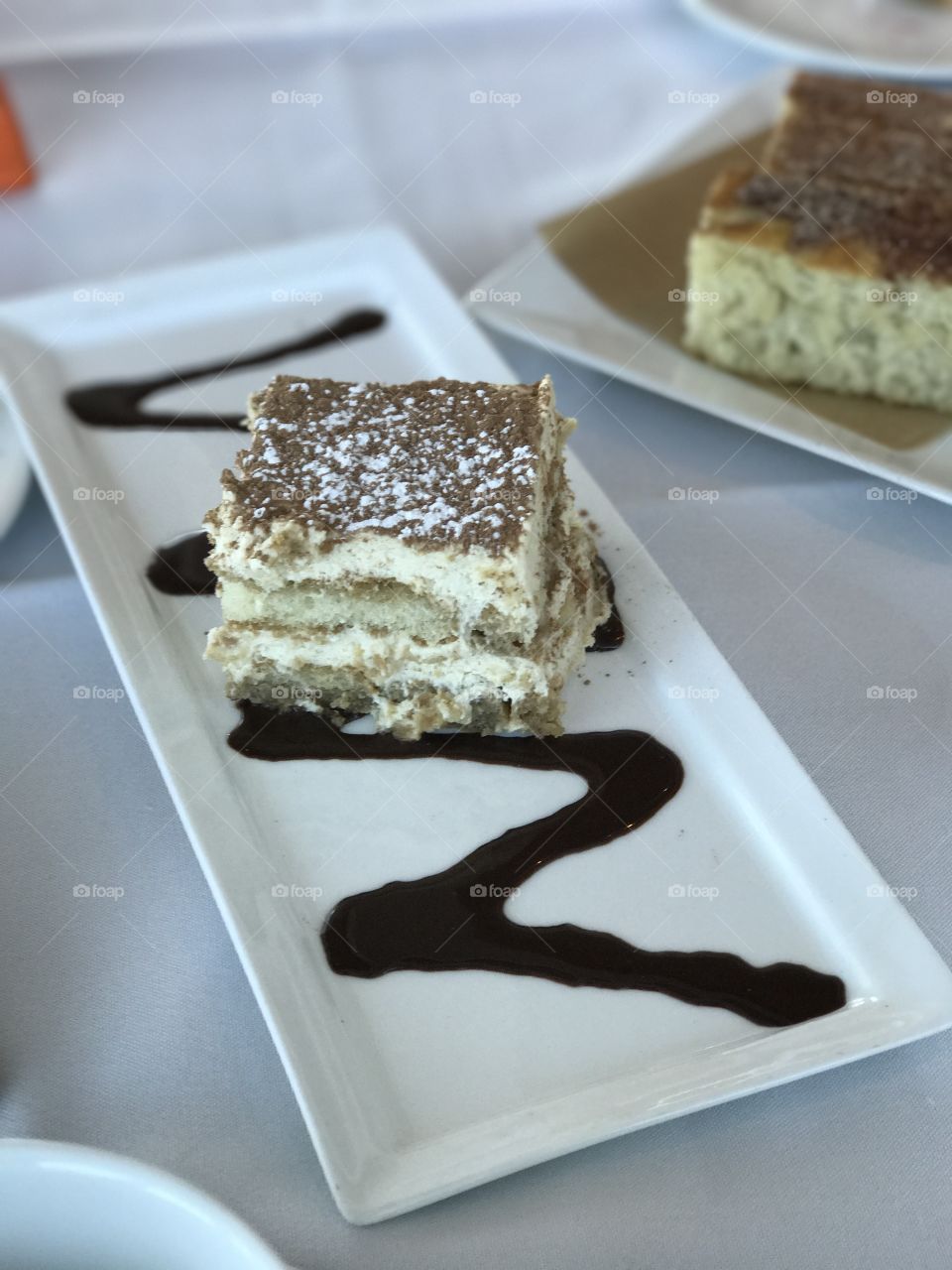 Tiramisu on white plate