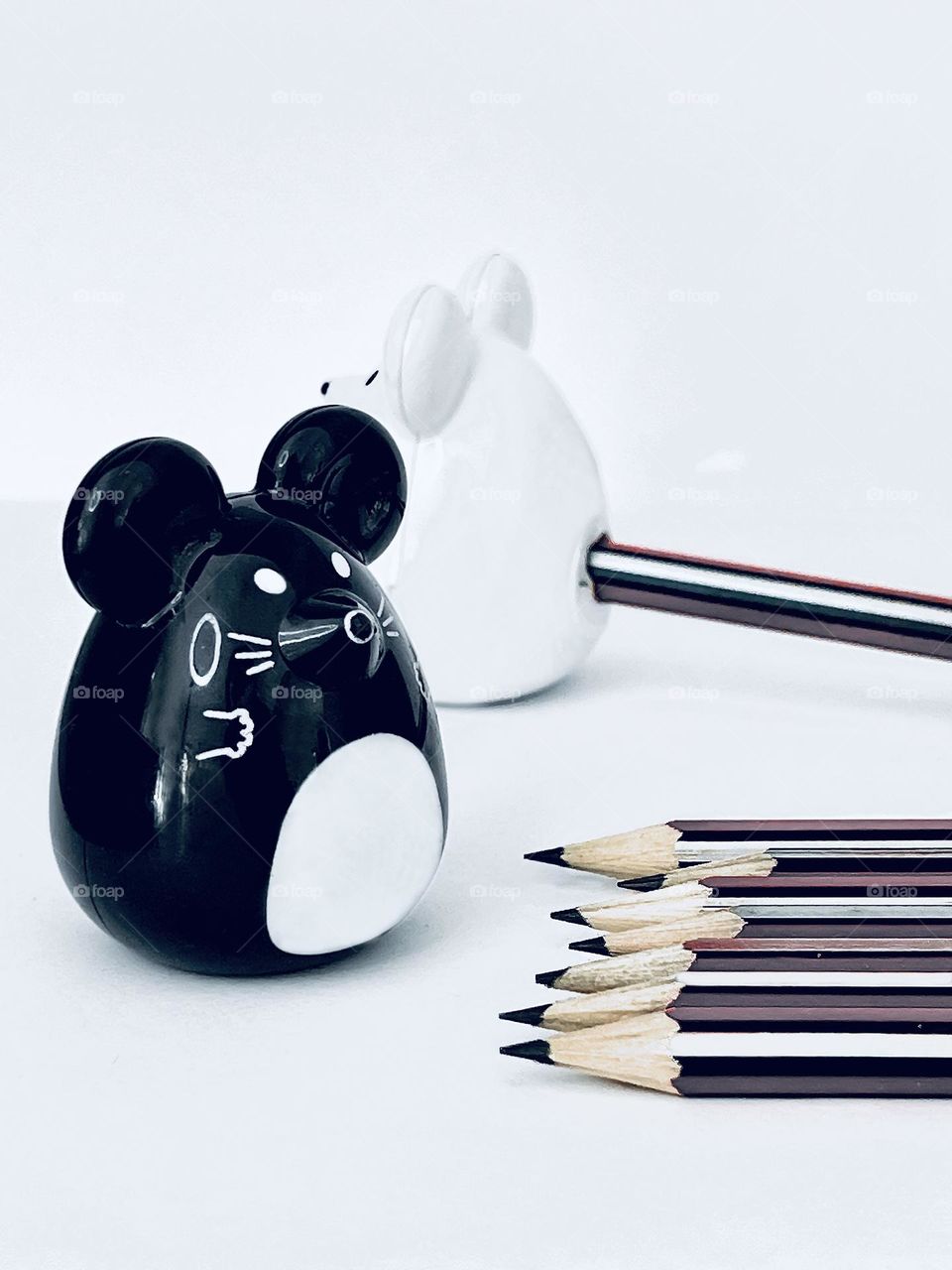 Stationery. Pencil sharpeners and pencils are shot on a white background 