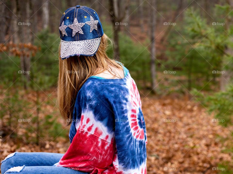 Our Freedom to find peace was paved by the perseverance of those that came before us. Woman reflecting on the lives of those that gave everything so she could just enjoy this moment. 