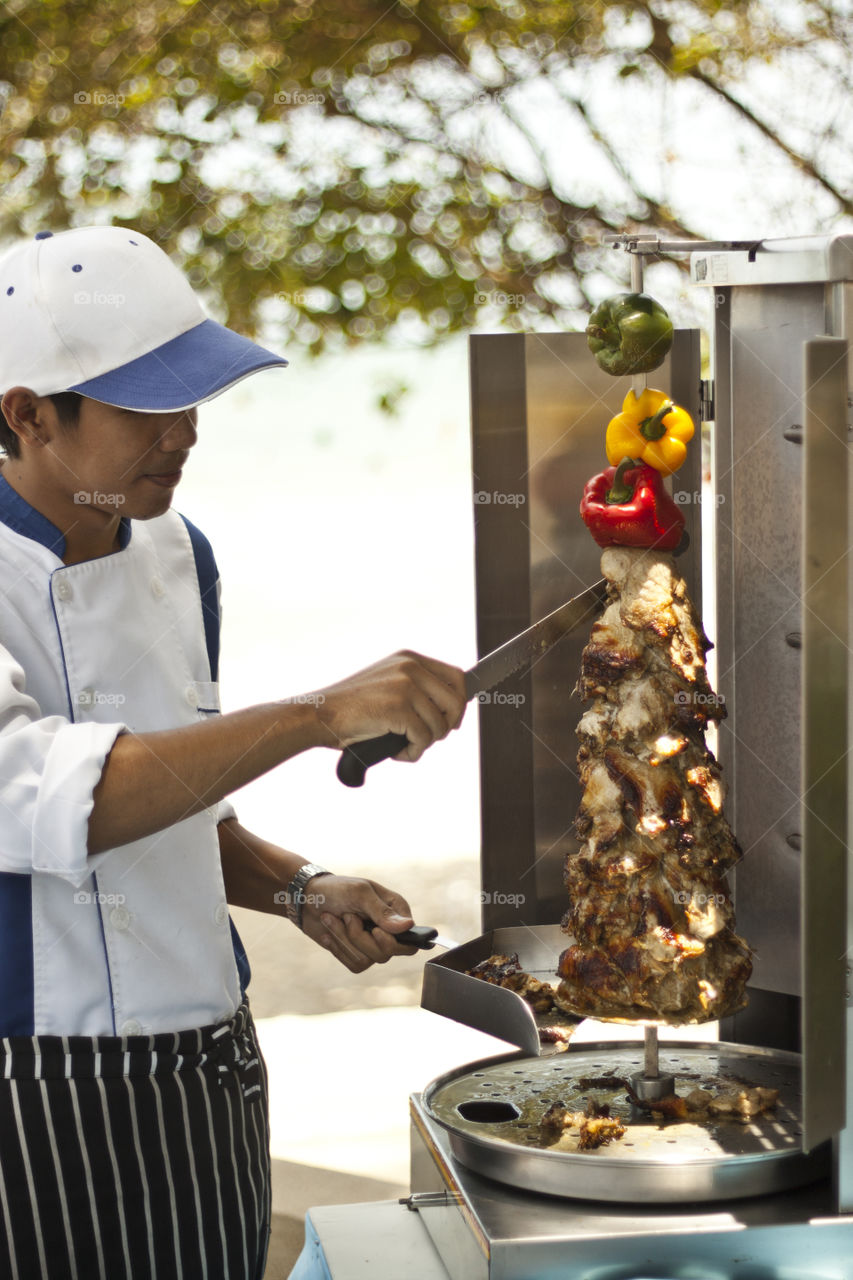 BBQ kebab master. summer time garden BBQ