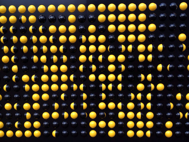 yellow wall black cross by dannytwotaps