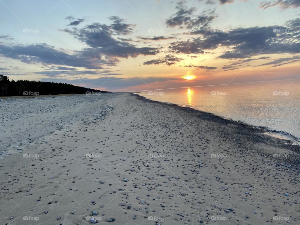Sunset on a Sandy beach on the shores of Lake Superior in the upper peninsula of Michigan