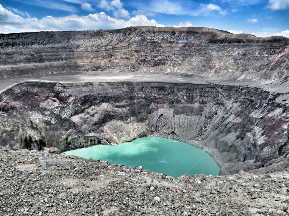 View from above while hiking the Santa Ana volcano in El Salvador. This large crater lake is gorgeous with it's pastel green colours. 