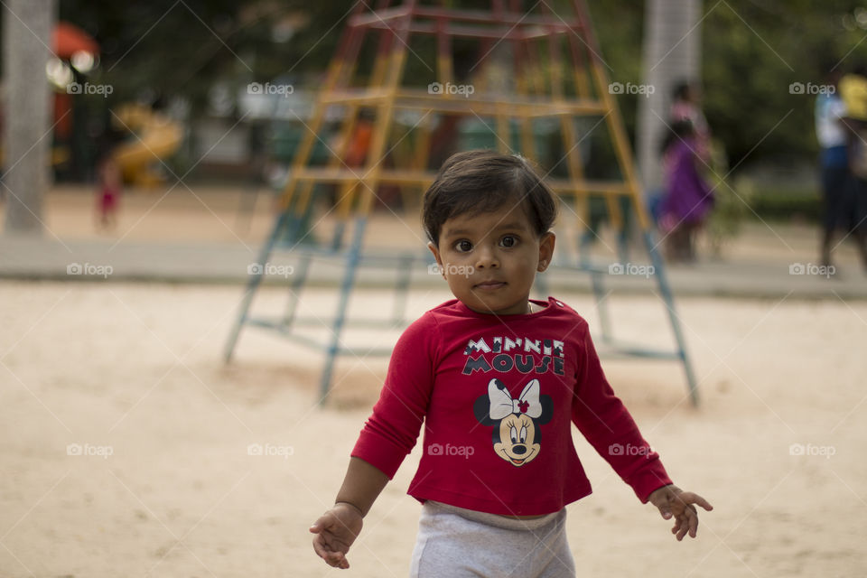 Portrait of a girl standing in park
