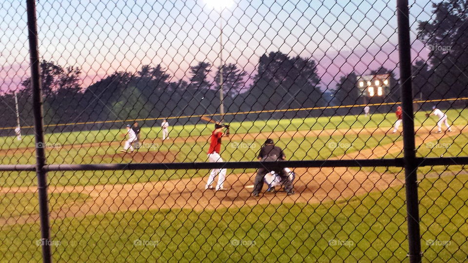 sunset baseball game. America's favorite pastime