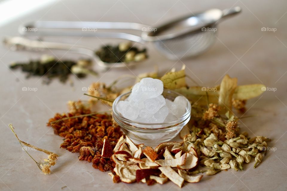 Bowl of sugar on herbs