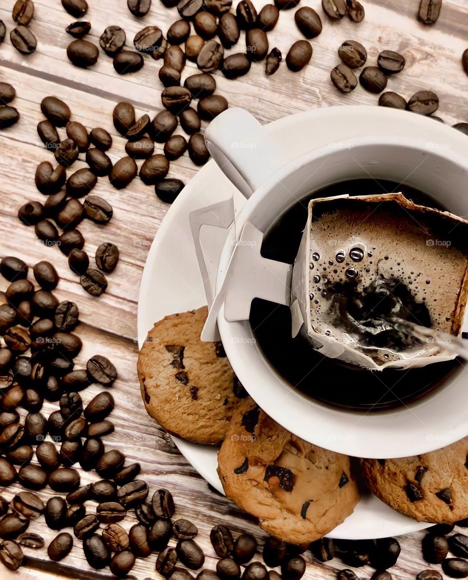 Cup of coffee and coffee beans 