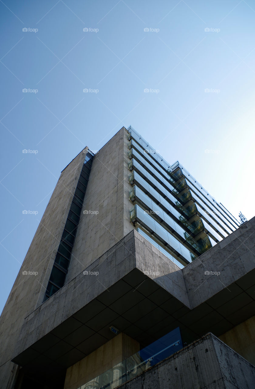 Low angle view of skyscraper against sky.