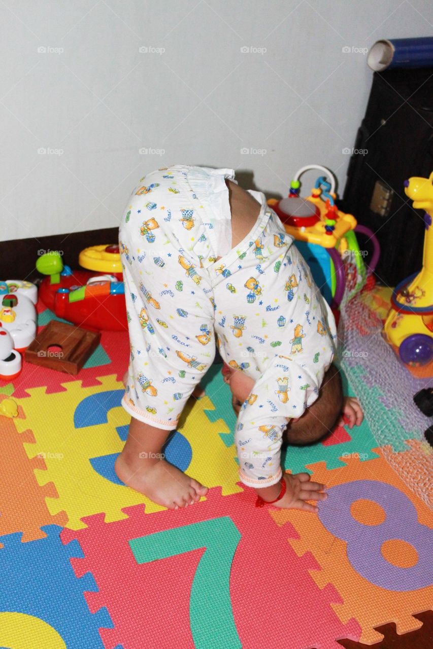 baby doing yoga 