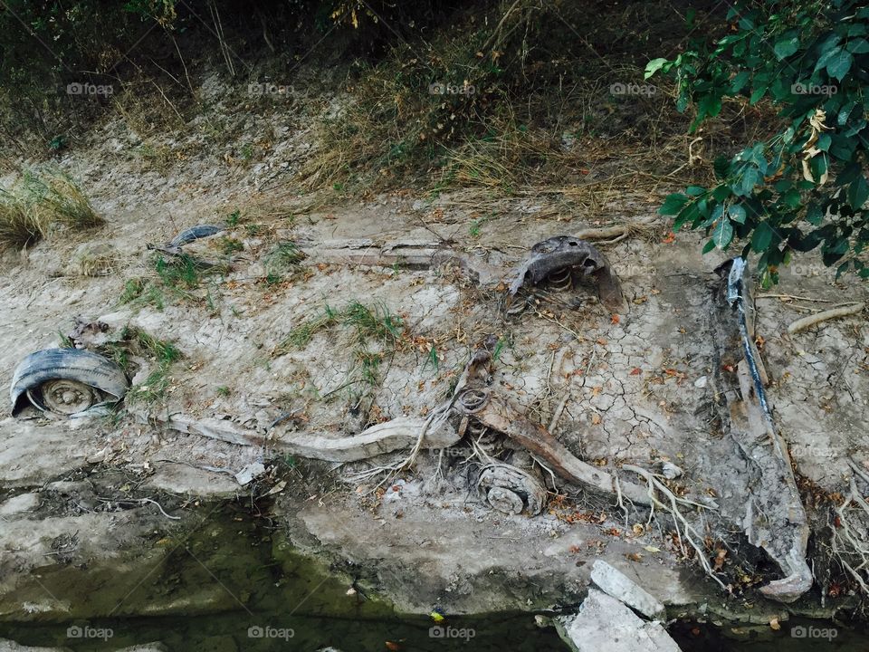 Harmon Fall Texas . This is a car where no car could drive to. 
Maybe flash flood placed it here. 