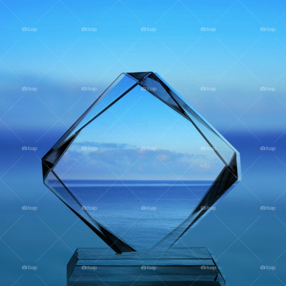 Diamond shape of crystal in front of sea