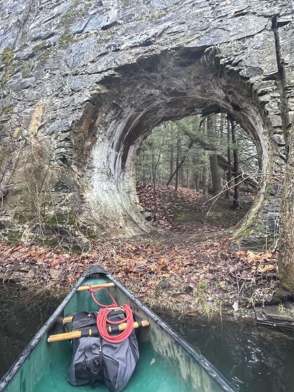 Exploring old hydro dam ruins by canoe 