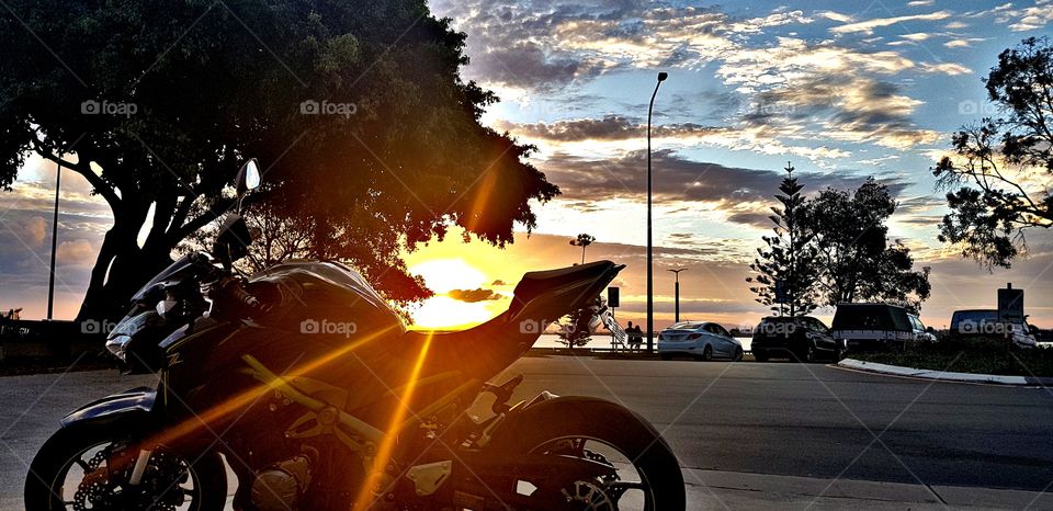 Sunset over a z 900 Kawasaki in Queensland