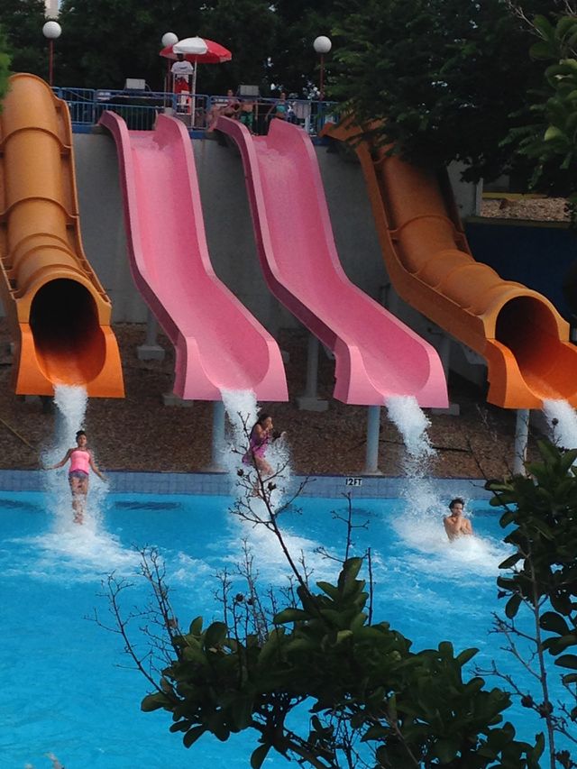 Shoot 'em out. High water pressure water slides at hurricane harbor