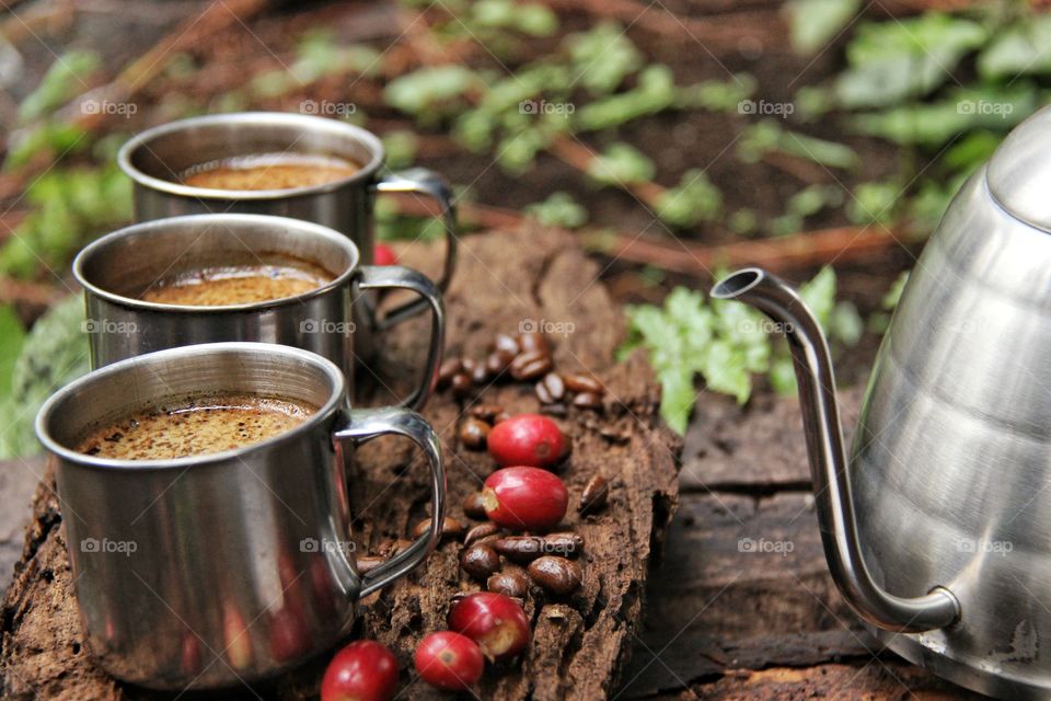 coffee beans with wooden table