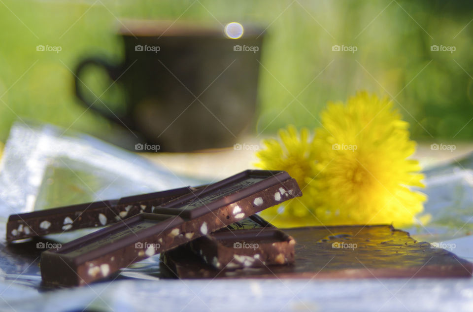 A cup of coffee and chocolate