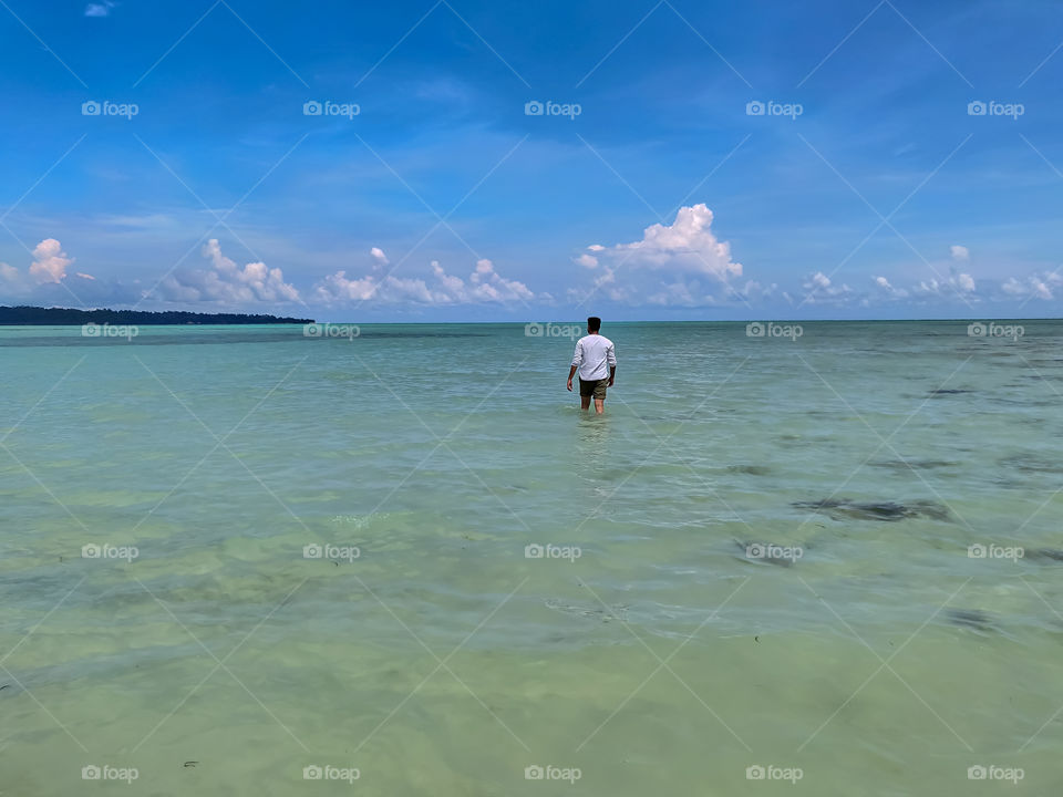 walking into the ocean