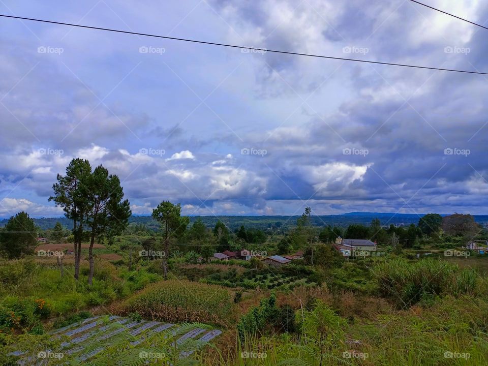 Panorama of meadows, forests and villages in Humbang Hasundutan district, North Sumatra province, Indonesia