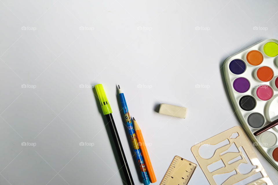 Drawing and Coloring Essentials on a table