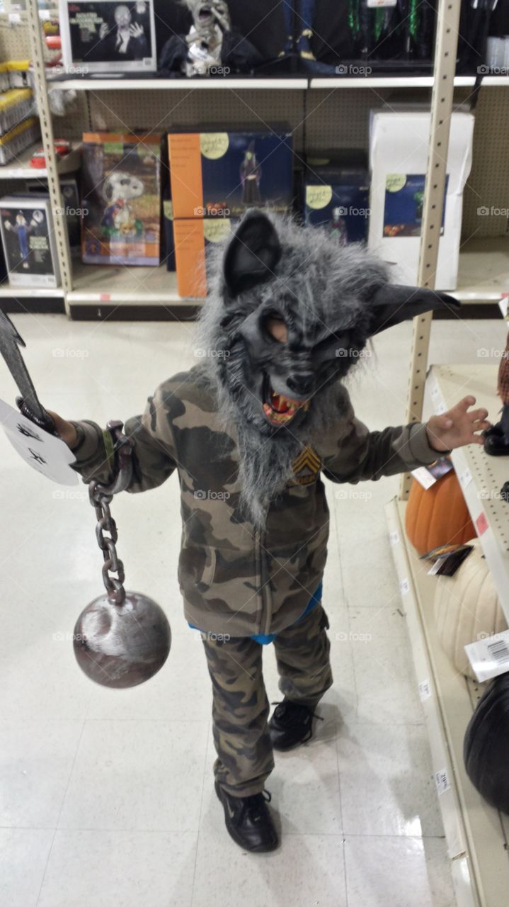 Halloween werewolf. trying on costumes at menards